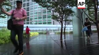 Heavy rains in Tokyo as typhoon hits Japan