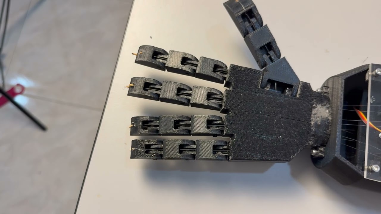 Design and Development of a Motorized Controlled EMG-Based Prosthetic Arm for Upper Limb Amputees