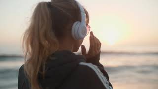 Beautiful girl listening music | Download Unlimited Free Stock Footage