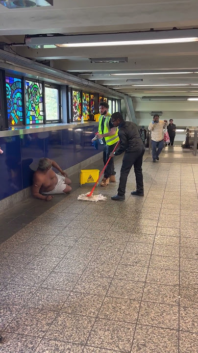 Homeless man gets angry when people wake him up cleaning around him!