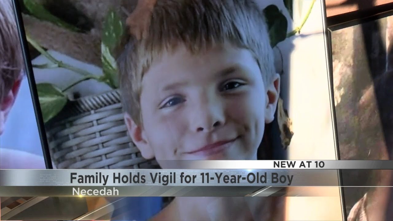 Family holds vigil for 11 year old boy - YouTube