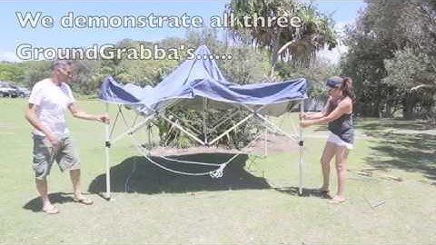 How to anchor your pop-up Ez-up shade structure on grass using screw in peg stakes
