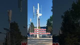 Vertical axis wind turbines are paired with photovoltaic (PV) power generation.