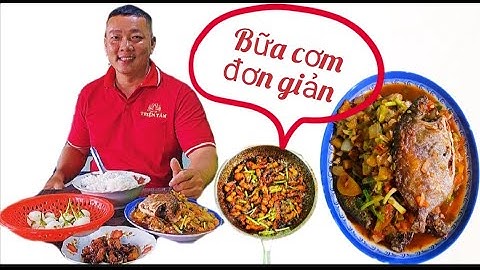 Bữa cơm gia đình đơn giản với hai món thịt kho khô tiêu, cá rô phi sốt cà chua