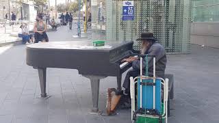 listen: An elderly ultra-Orthodox Jewish man plays the piano so beautifully at Jerusalem, Israel