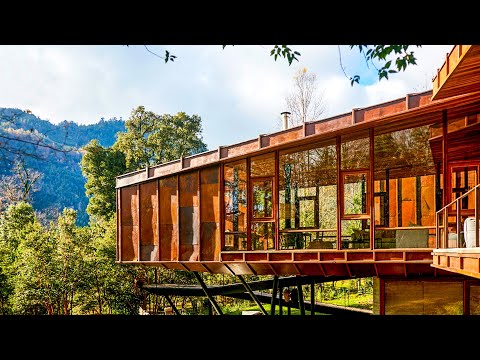 Video: Súčasný dizajn využívajúci prírodné materiály: rezidencia jazera Travis