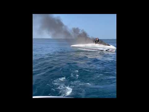 Couple Rescues Two People From Burning Boat