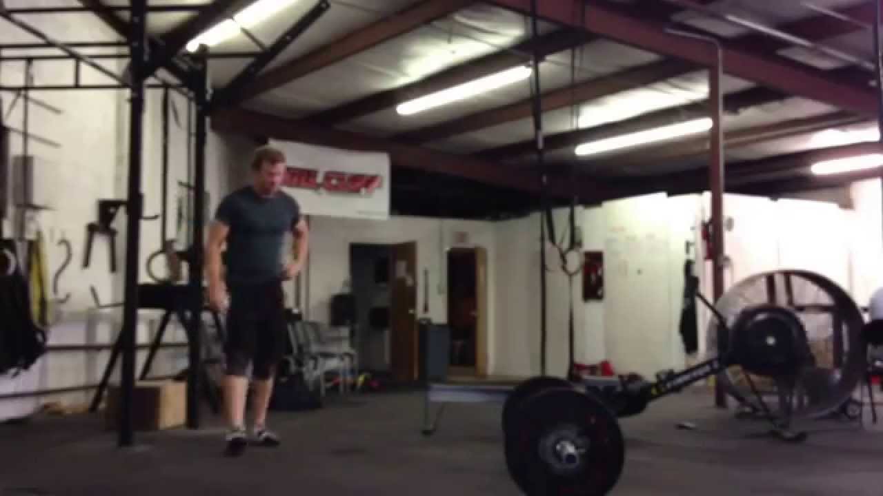 First round of 15-12-9 calorie row, ctb pull up, OHS @165 - YouTube