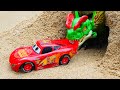 Playing with dinasours and cars