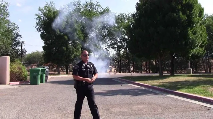 APD SWAT Officer Throws Flash Bang Grenade