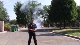 APD SWAT Officer Throws Flash Bang Grenade