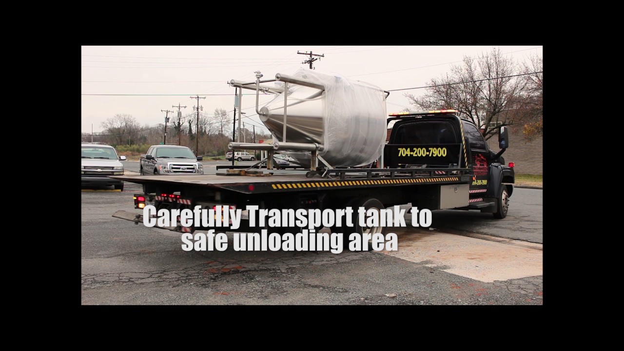 How To: Unload Brewing Tanks using a Flatbed Towtruck