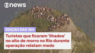 Tourists who were 'stranded' on a hilltop in Rio during an operation report fear.