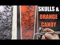 Airbrushing Skulls with orange candy.