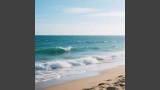 Ombak memecah di tepi pantai,