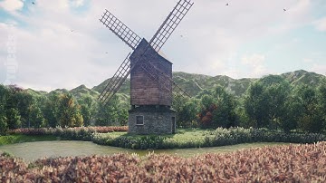 Traditional village windmill standing near the pond against the background of mountains and clouds