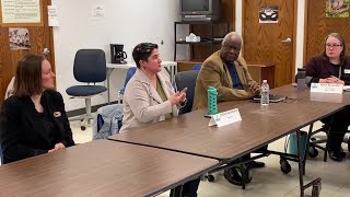 Racine resident and former Journal Times reporter Janine Anderson speaks at round table