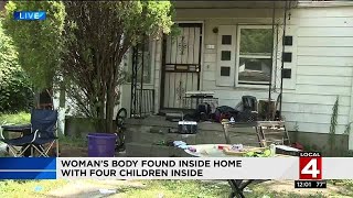 Woman's body found inside home with four children inside