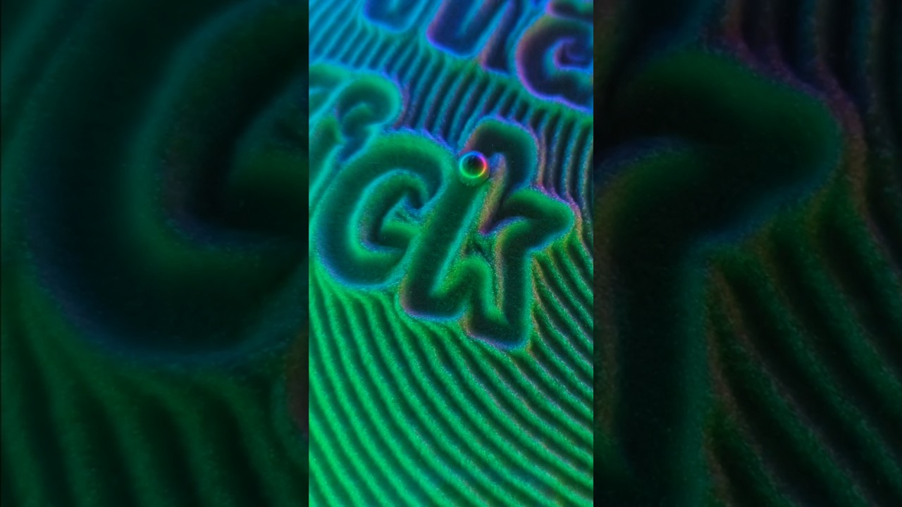 This kinetic art canvas can write text in sand 