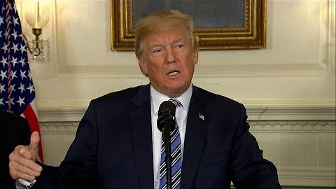 "Disappointed" Trump signs spending bill after threatening veto