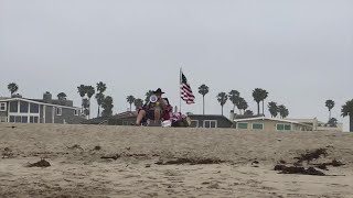Man with magaphone protests soft closure rules at Hollywood Beach screenshot 3