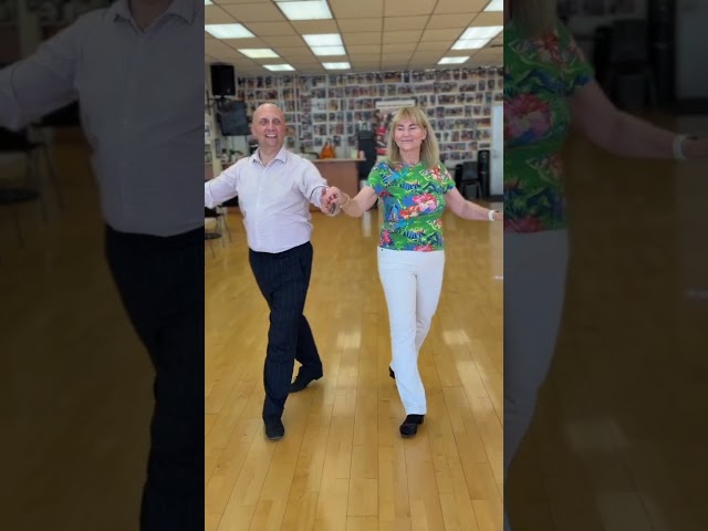 Pat Rives is one of our beloved students is demonstrating a beautiful waltz with her instructor Oleg Suvorov