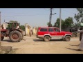 Land cruiser vs Russian Tractor - Yasir Maken