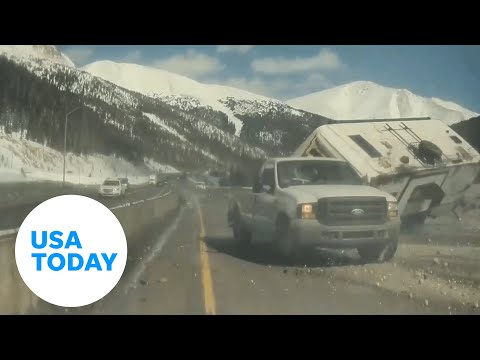 Driver says huge pothole caused crash on I-70 in Colorado | USA TODAY