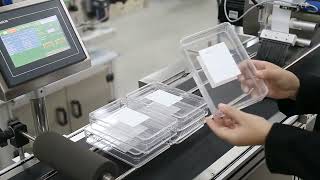 trays boxes sticker labeling machine flat products labeller