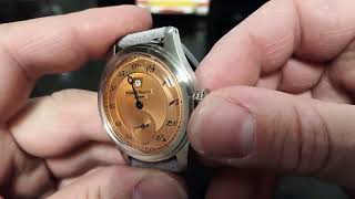 MERKUR PIERRE PAULIN JUMPING HOURS PINK SALMON DIAL BLUE HANDS REGULATOR SALTARELLO AUTOMATIC WATCH