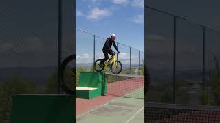 Riding A Bike Across A Tennis Net 🎾