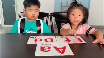Tiếng Anh Giao Tiếp Phan Thiết: Jason and Alice practice talking about Alphabet