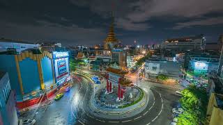 Bangkok Skyline Taken Over Chinatown Gate And The Majestic Wat Tramit Temple - 4K Night Timelapse