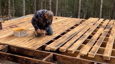 In the wilderness building an off grid log cabin