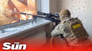 Ukrainian snipers fire at Russian soldiers on urban battlefield in Bakhmut