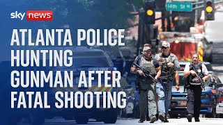 One dead and four injured at medical facility in Atlanta, with gunman on the run