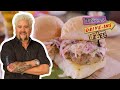 Guy eats lamb sliders at maneet chauhans restaurant  diners driveins and dives  food network