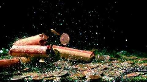 Free Slow Motion Footage: Falling Coins Over Confetti