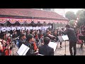 Wacana bhakti symphony orchestra  bendera cokelat