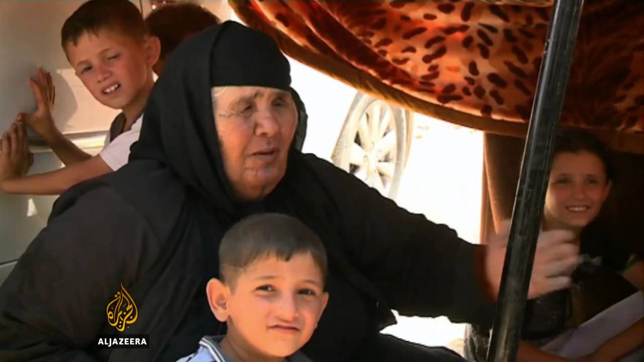 لاجئون عراقيون يفرون من الصراع