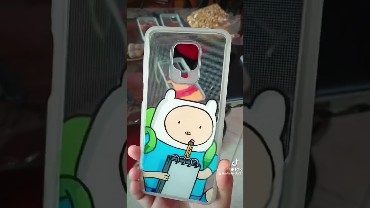 (Commission) painted finn the human from adventure time in a phone case 