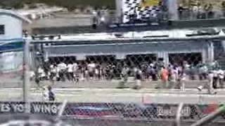 Casey Stoner arriving at parc ferme
