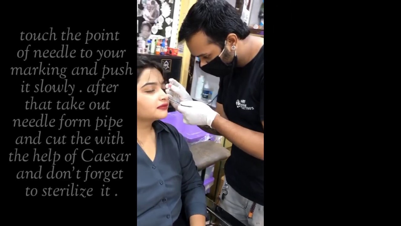 Nose piercing by professional tattoo and piercing artist - #illuminatimohit - YouTube