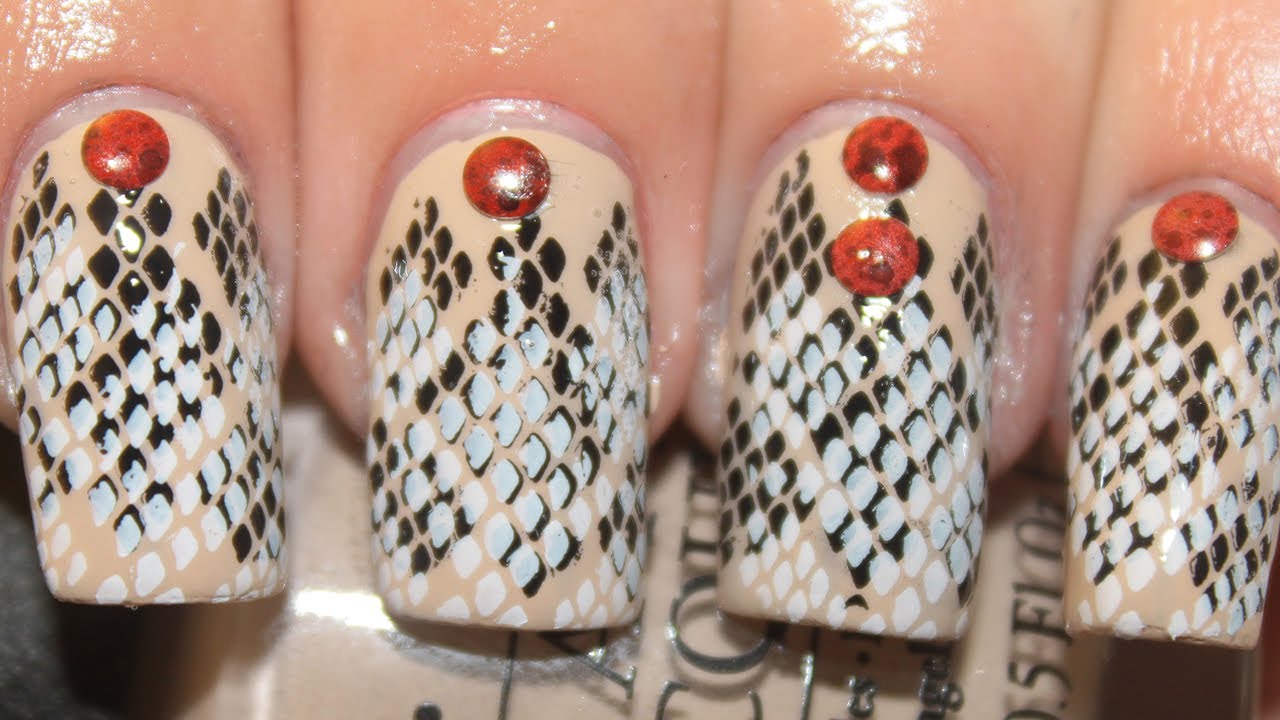 7. Black and White Snake Nails - wide 9