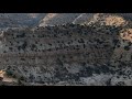 The Evolution of Devil's Canyon Through Erosion and Sedimentary Layers