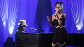 Miley Cyrus Performs 'Hands of Love' with Linda Perry chords