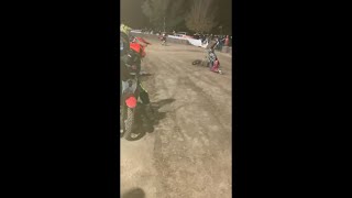 Guy Faceplanting After Falling off His Bike at the Starting Line During a Pitbike Race