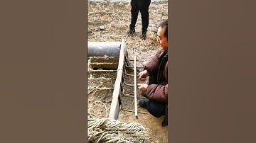 Traditional rope making: people making rope using traditional methods and wooden tools