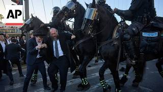 Ultra-Orthodox Israeli protesters block roads and trains over military draft