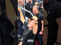 Arnold Schwarzenegger getting a back pump at the 2026 Arnold Expo